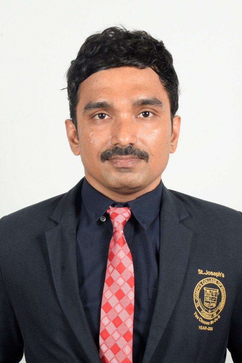 Dr. K. J. Arun